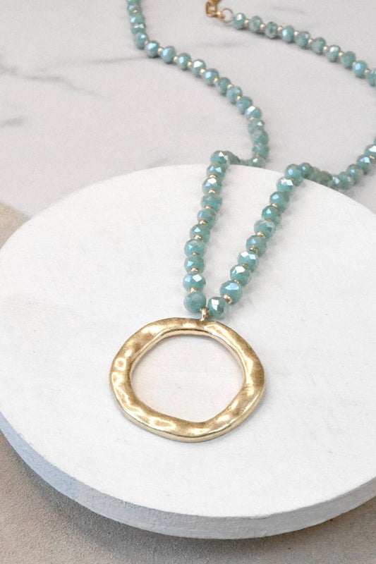 PeBeaded Necklace with Gold Tone Circle Pendant Aqua